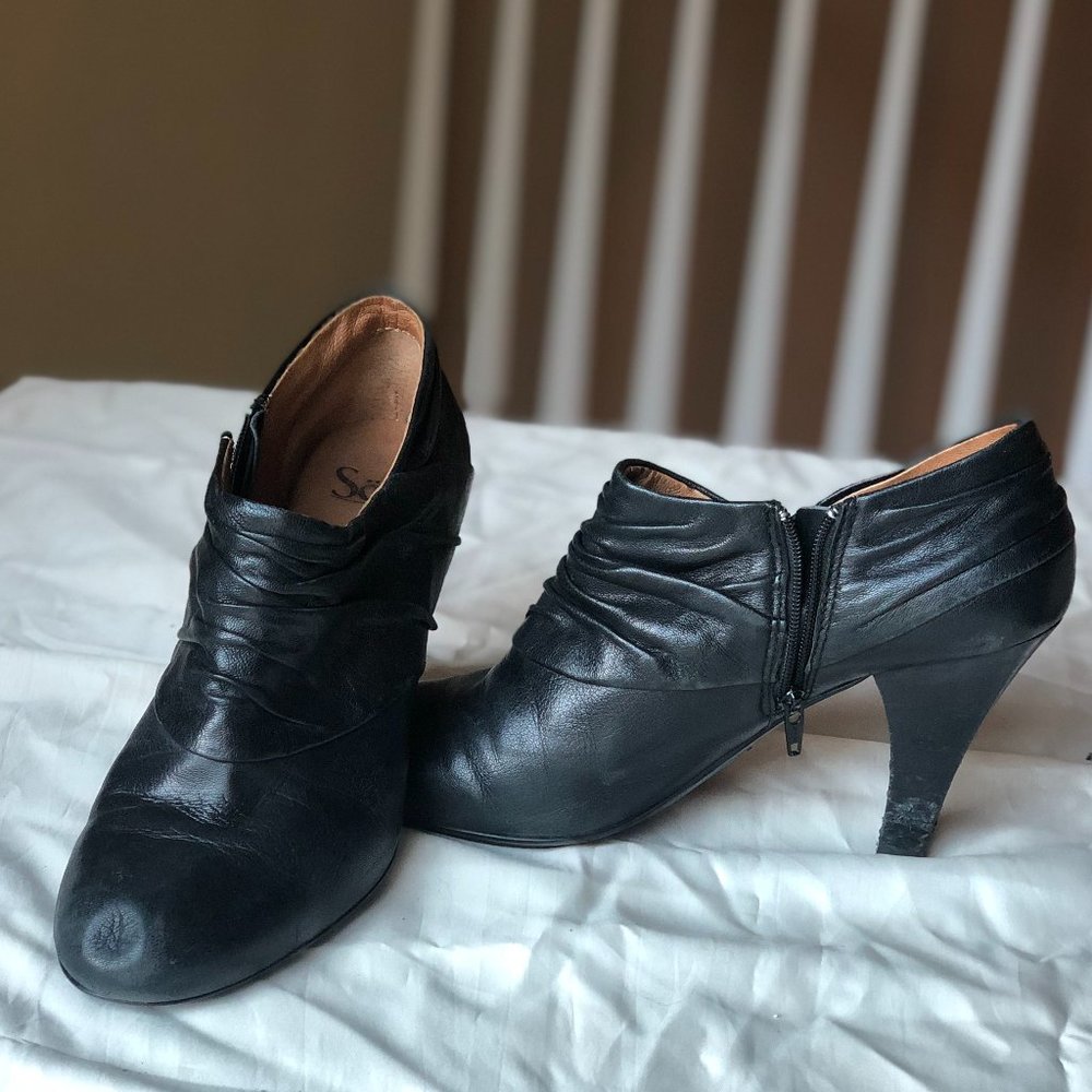 Black leather booties by Sofft